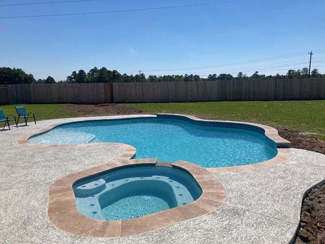 Commercial pool area with deck