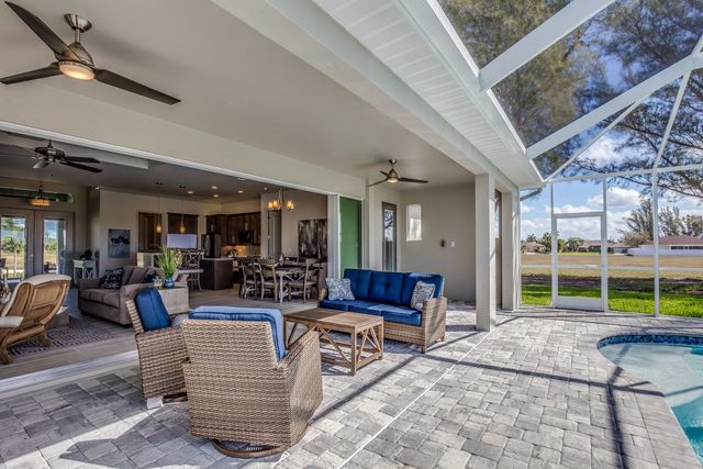 Outdoor living space with patio and landscape features