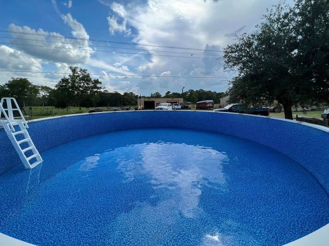 Residential backyard pool with patio